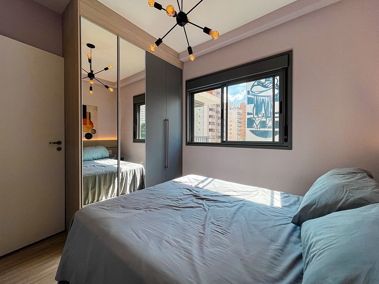 Dormitorio y plaza de estacionamiento en Jardins