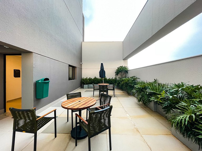 Features a balcony and a rooftop with a pool