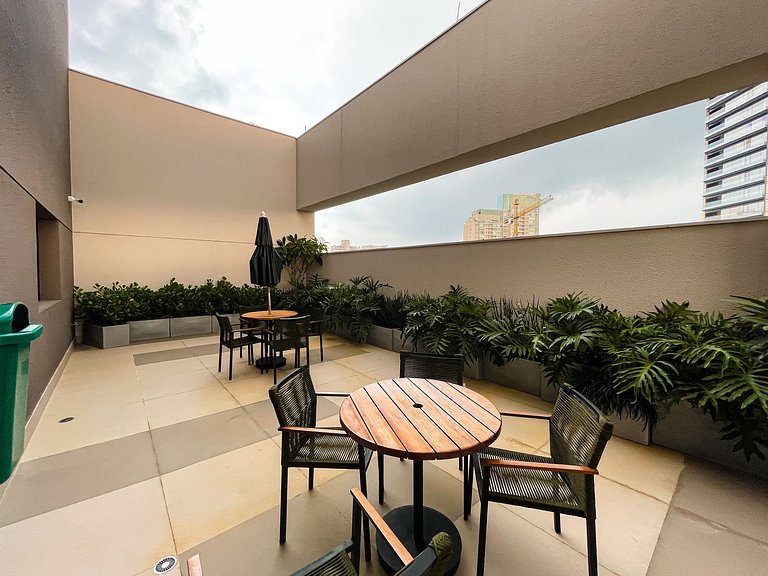 Features a balcony and a rooftop with a pool