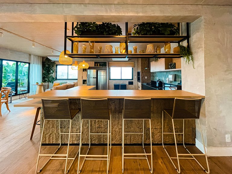 Features a balcony and a rooftop with a pool