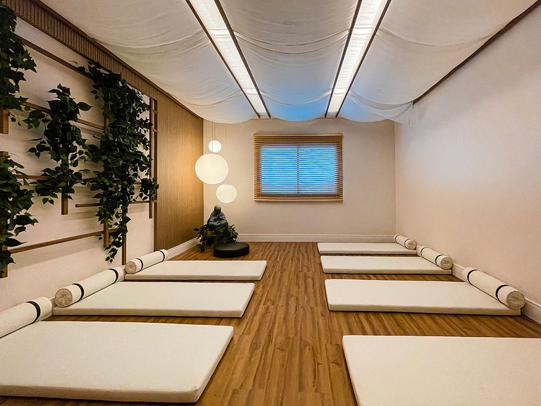 Features a balcony and a rooftop with a pool