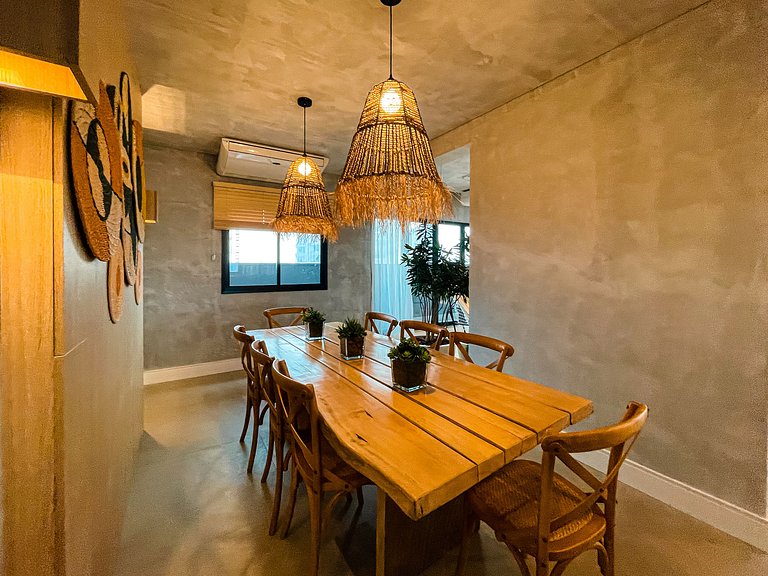 Features a balcony and a rooftop with a pool