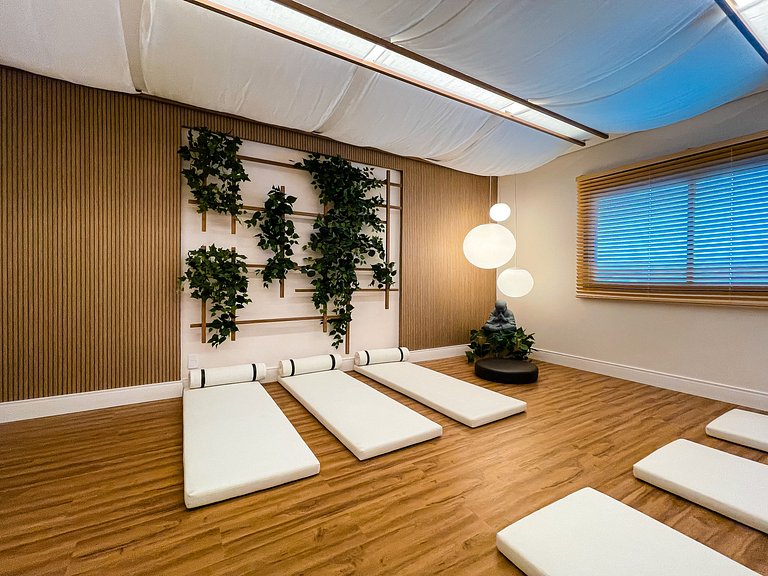 Features a balcony and a rooftop with a pool