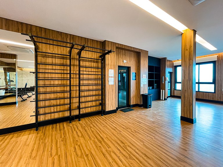 Features a balcony and a rooftop with a pool