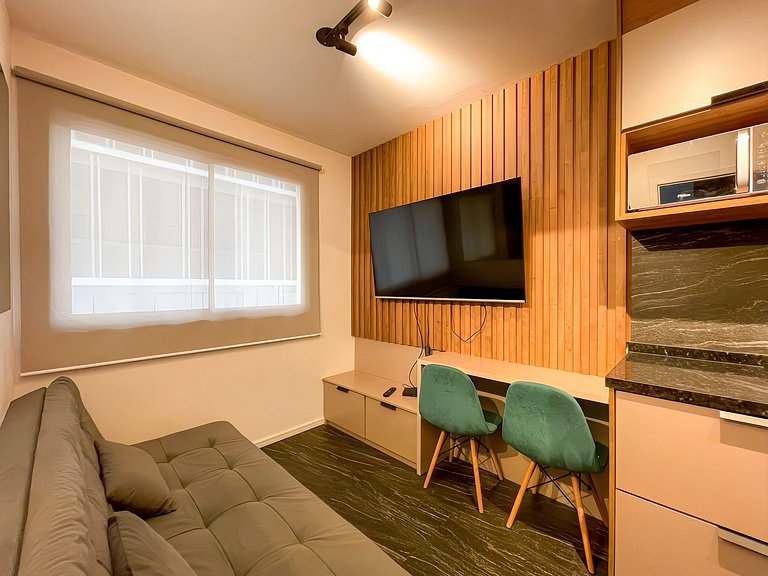 Features a balcony and a rooftop with a pool