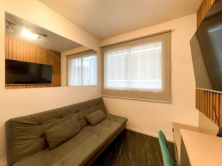 Features a balcony and a rooftop with a pool