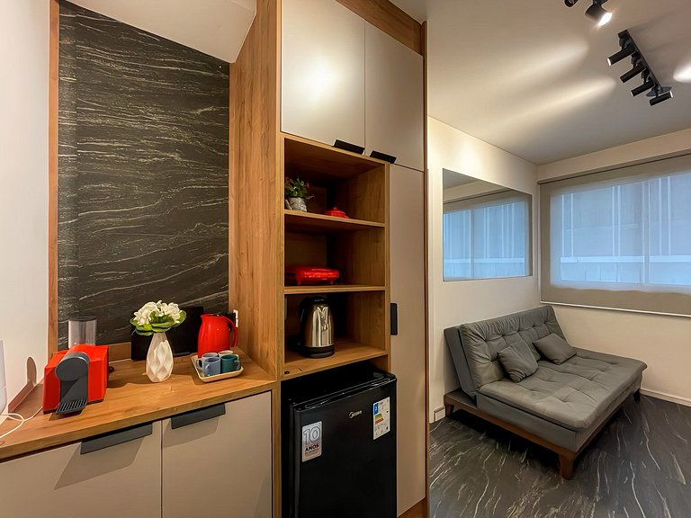 Features a balcony and a rooftop with a pool