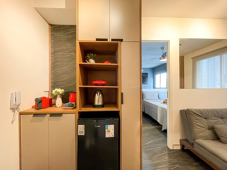 Features a balcony and a rooftop with a pool