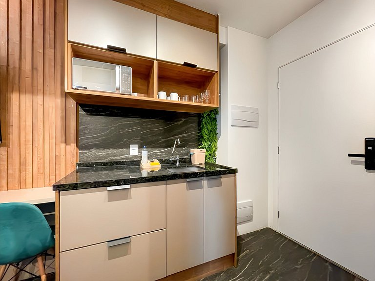 Features a balcony and a rooftop with a pool