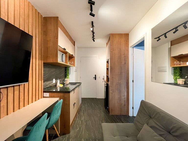 Features a balcony and a rooftop with a pool