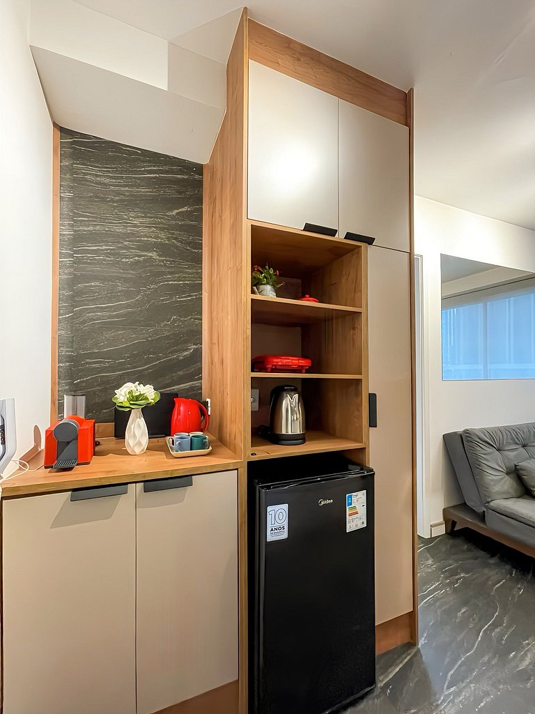 Features a balcony and a rooftop with a pool