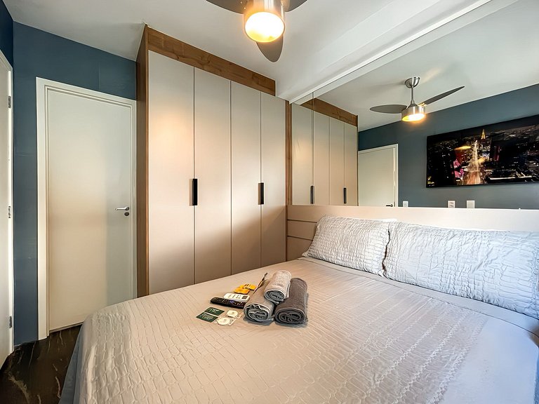 Features a balcony and a rooftop with a pool