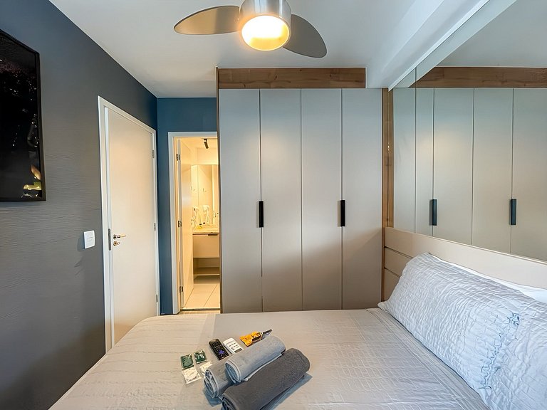 Features a balcony and a rooftop with a pool