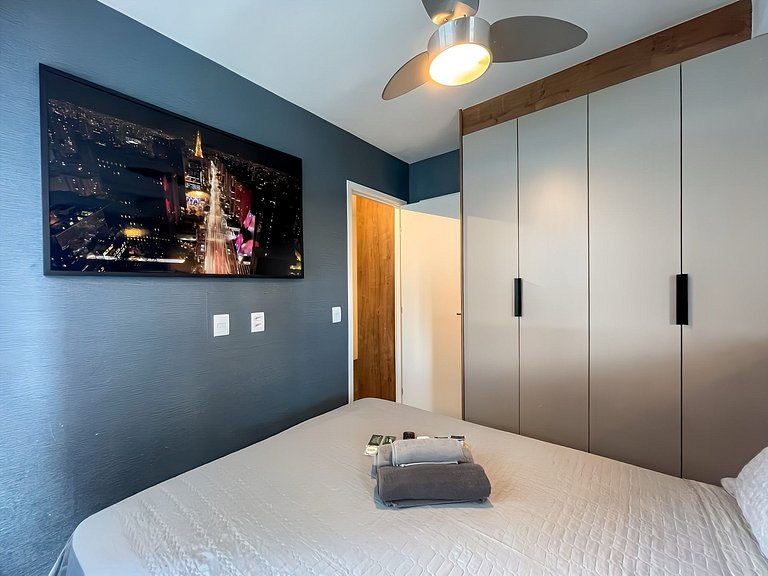 Features a balcony and a rooftop with a pool