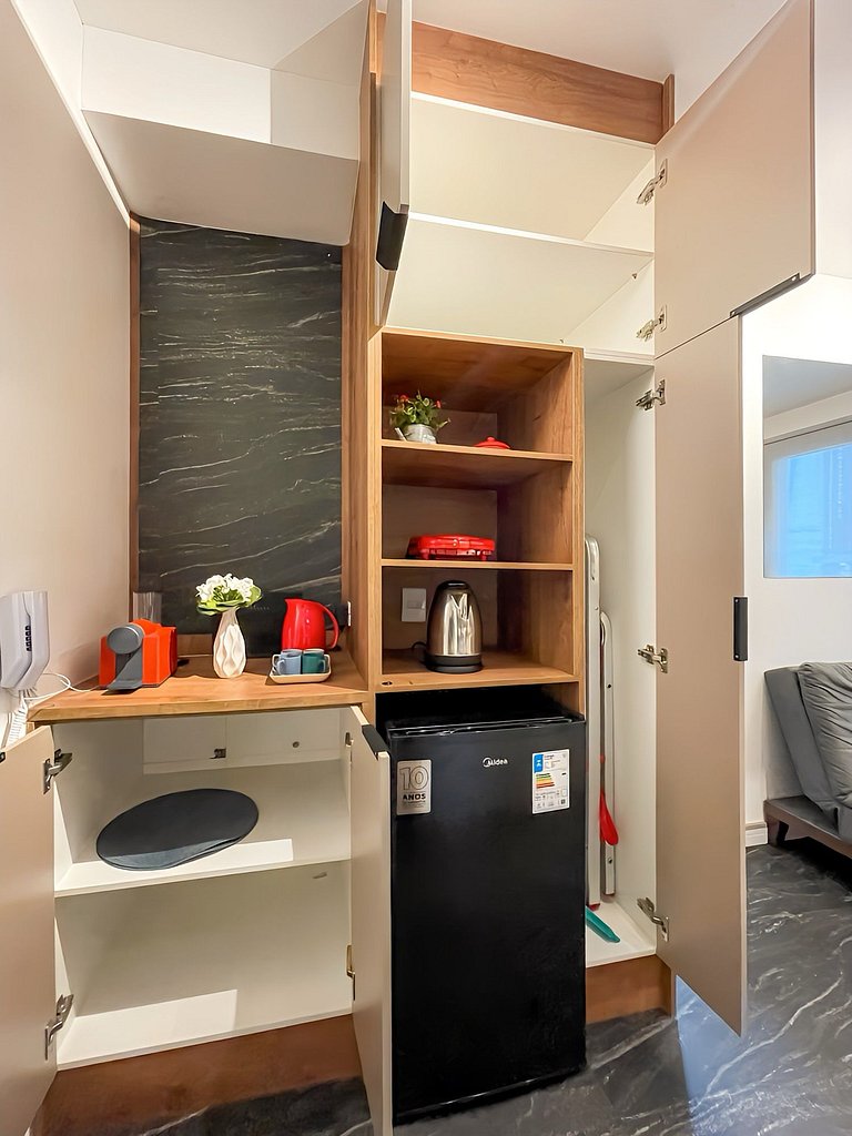 Features a balcony and a rooftop with a pool